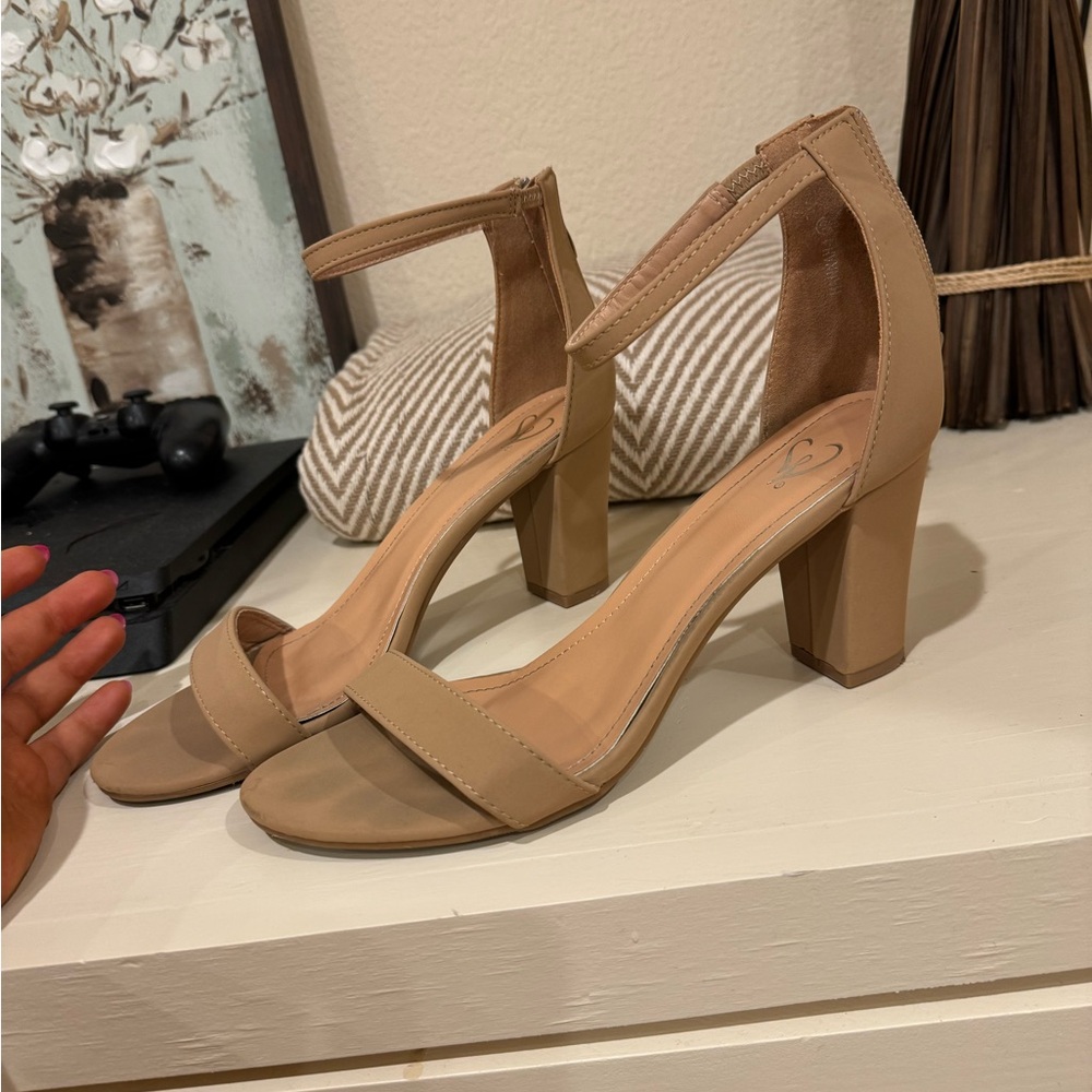 Windsor tan heels. Worn a couple times.